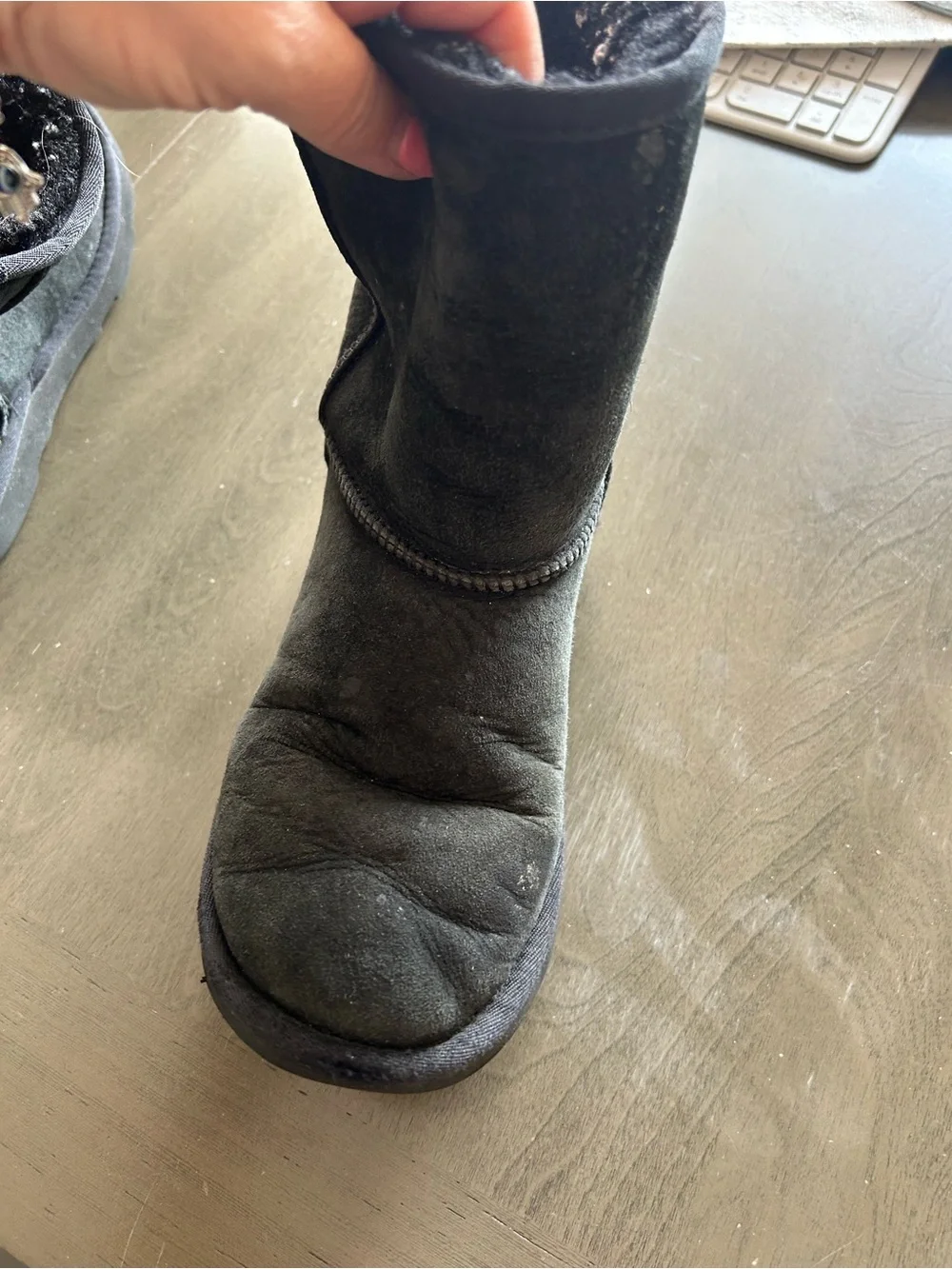 Well loved UGG Black Suede Shearling Boots